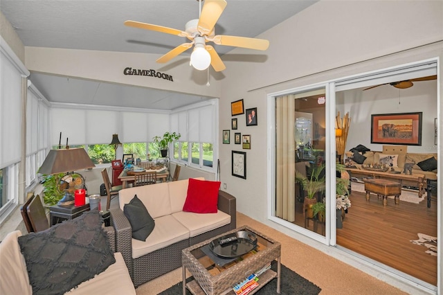 sunroom / solarium with a ceiling fan