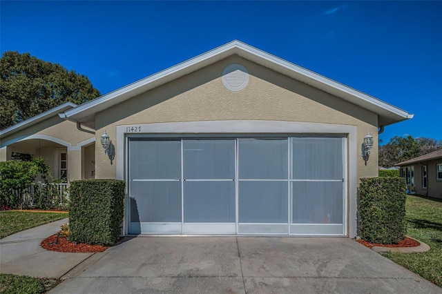 view of side of home featuring stucco siding