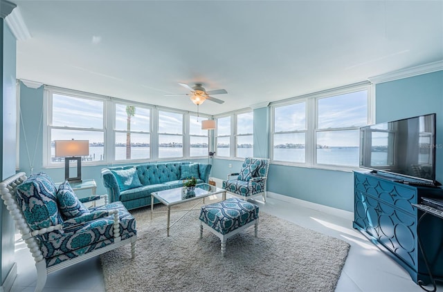 sunroom with a ceiling fan