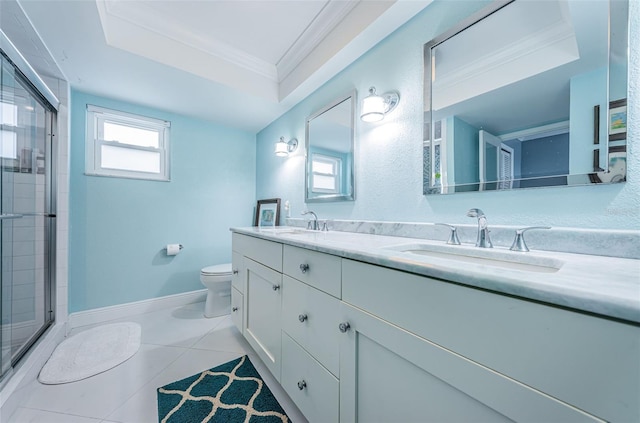 full bathroom with a sink, baseboards, ornamental molding, a tray ceiling, and a stall shower