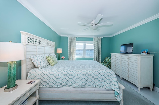 bedroom featuring a ceiling fan and crown molding