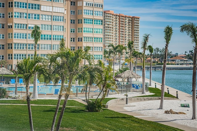 exterior space featuring a water view, a lawn, and a gazebo