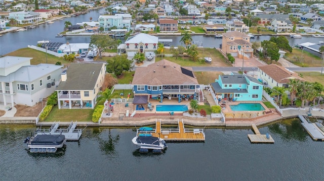 drone / aerial view with a water view