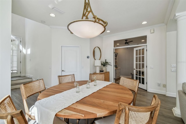 dining room featuring ceiling fan, ornamental molding, and dark hardwood / wood-style floors