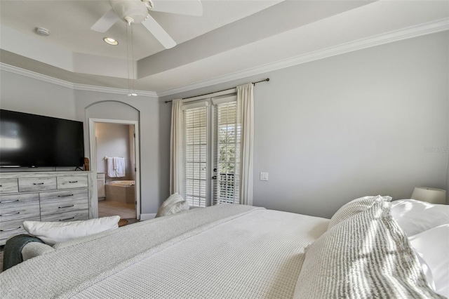 bedroom with ensuite bathroom, access to outside, ornamental molding, a raised ceiling, and ceiling fan