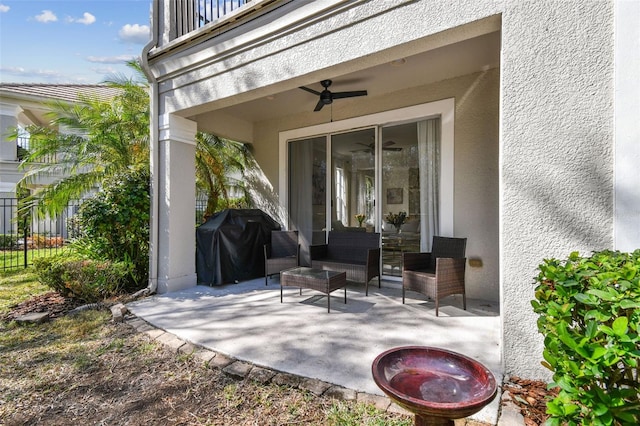 view of patio / terrace featuring ceiling fan, an outdoor hangout area, area for grilling, and a balcony