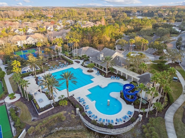 view of swimming pool with a water slide