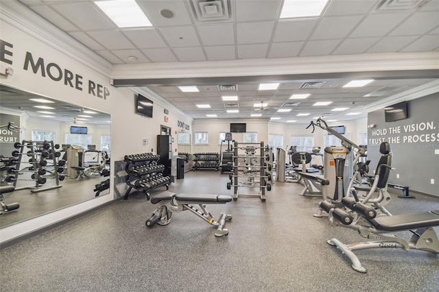 gym featuring crown molding and a paneled ceiling