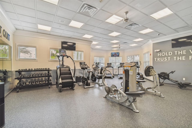 gym featuring crown molding and a paneled ceiling