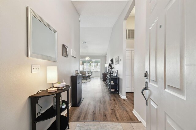 foyer with wood-type flooring