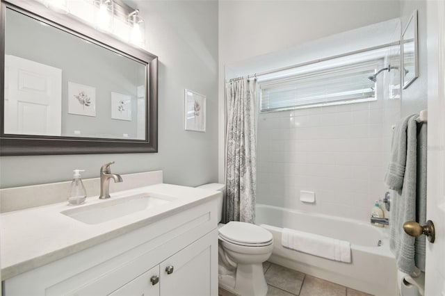 full bathroom featuring vanity, shower / bath combination with curtain, tile patterned floors, and toilet