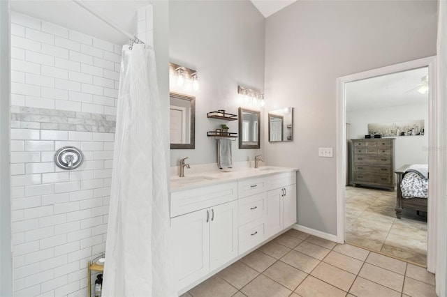 bathroom with vanity, tile patterned flooring, and a shower with curtain