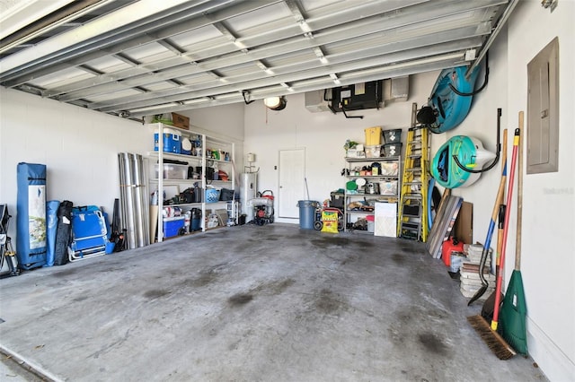 garage with electric panel and water heater