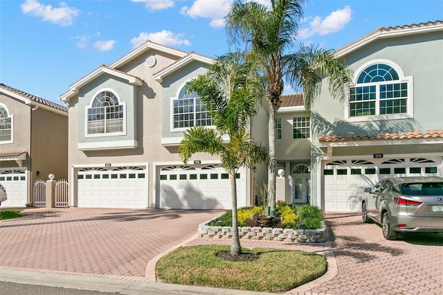 mediterranean / spanish-style home featuring a garage