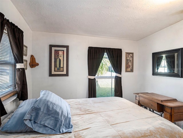 bedroom with a textured ceiling