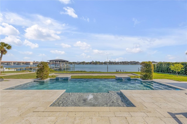 view of swimming pool with a gazebo and a water view