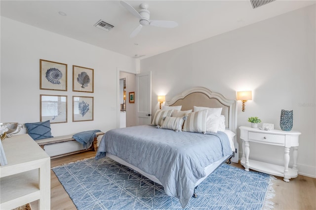 bedroom featuring hardwood / wood-style flooring and ceiling fan