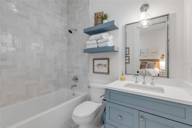 full bathroom with tiled shower / bath combo, vanity, and toilet