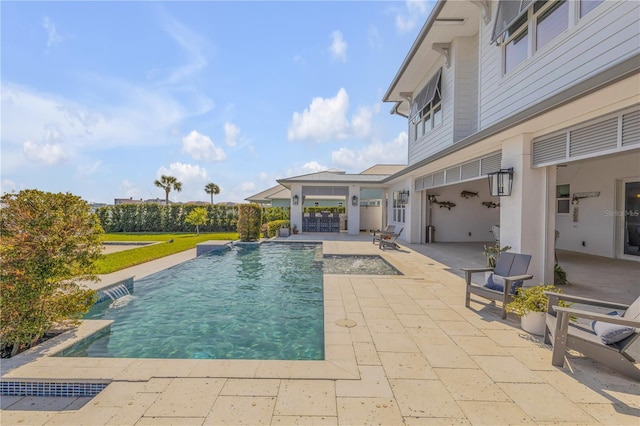 view of swimming pool featuring a patio and pool water feature