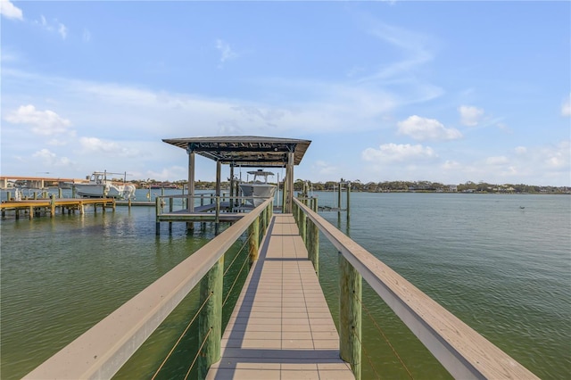 view of dock with a water view