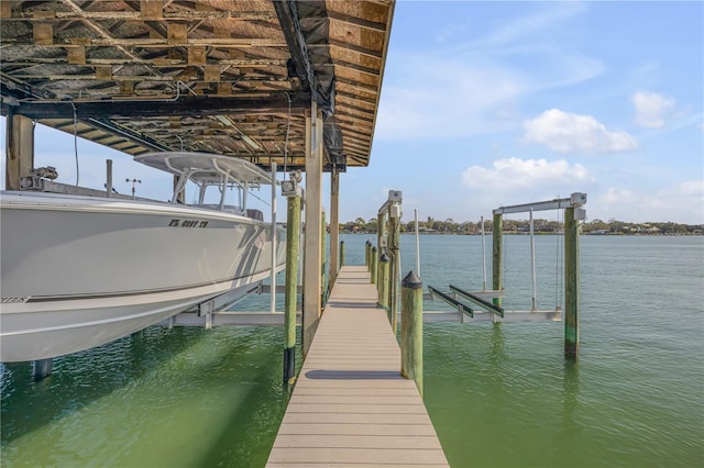 view of dock with a water view