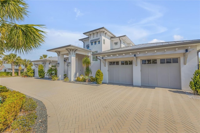 view of front of home with a garage