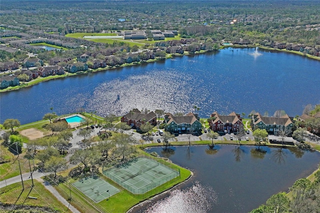 bird's eye view featuring a residential view and a water view