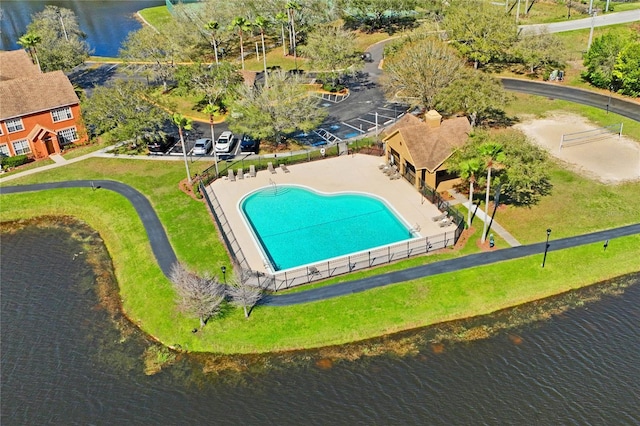 birds eye view of property with a water view