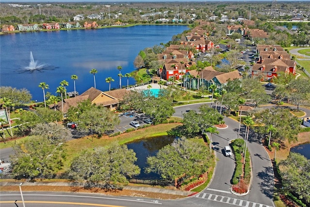 aerial view with a water view and a residential view