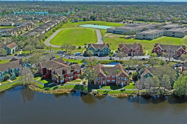 bird's eye view with a residential view and a water view