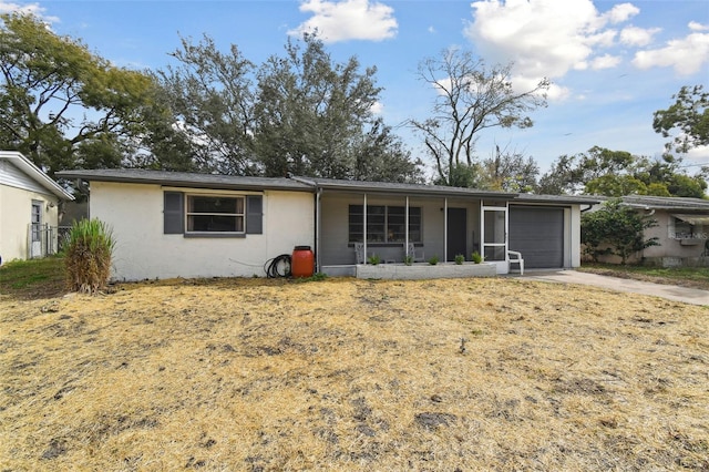 single story home with a garage