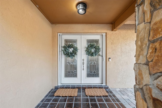 doorway to property featuring french doors