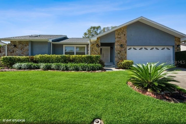 ranch-style house with a garage and a front yard