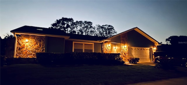 view of front of property featuring a garage