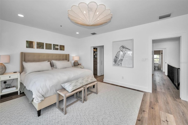 bedroom with light wood-type flooring