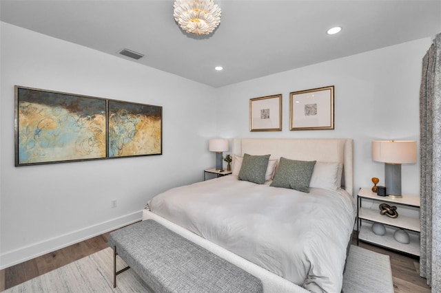 bedroom featuring hardwood / wood-style flooring