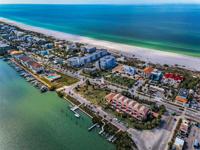 bird's eye view featuring a water view and a view of the beach