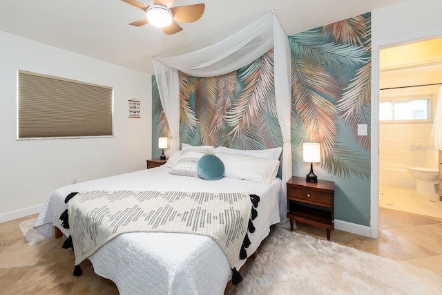 bedroom with ceiling fan, ensuite bath, and light tile patterned floors