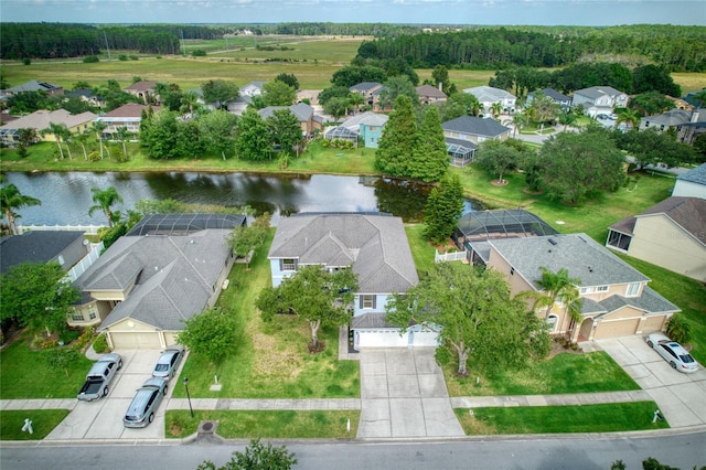 aerial view with a water view and a residential view