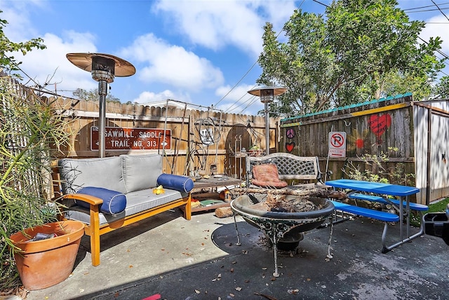 view of patio featuring fence