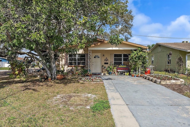 5559 17th Ave N, Saint Petersburg, FL 33710 - view of front of home with a porch and brick siding