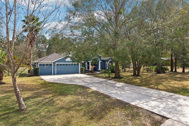 obstructed view of property with a garage and a front yard