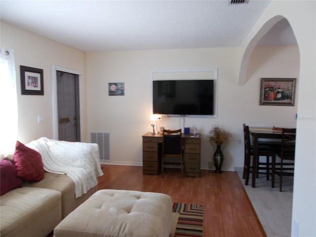 living room featuring light wood-type flooring