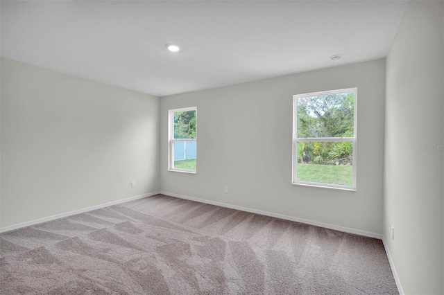 view of carpeted spare room