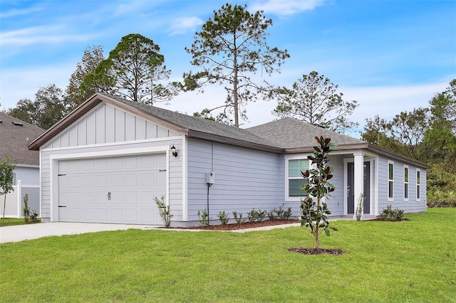 single story home with a garage and a front lawn