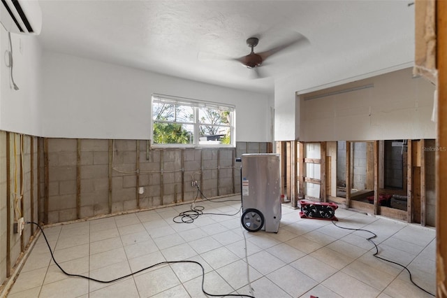 interior space featuring ceiling fan and a wall mounted air conditioner