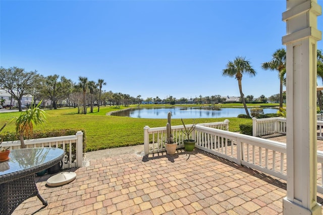 view of patio / terrace with a water view