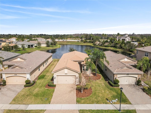 bird's eye view with a water view