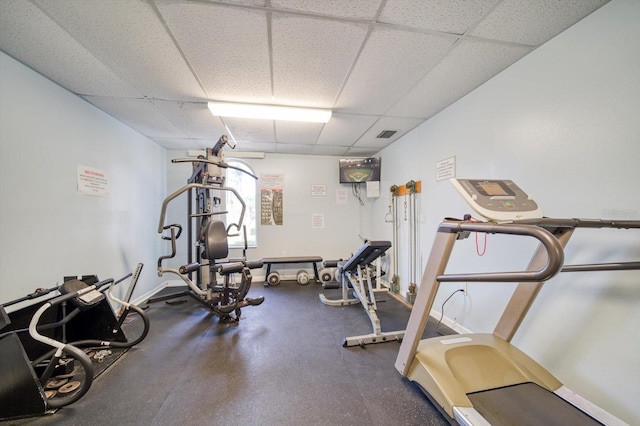 exercise area featuring a drop ceiling