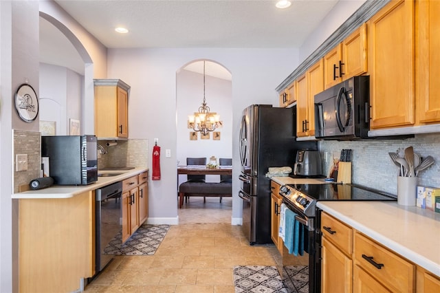 kitchen with black microwave, light countertops, dishwashing machine, and stainless steel electric stove